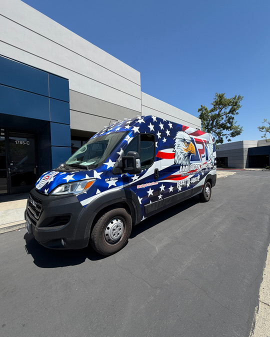 RAM ProMaster van with American flag graphics wrapped by Print Signs Wraps, Corona CA